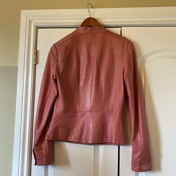 Danier pink leather jacket.  Lightly worn.    Marks as detailed in photos.  XS - Picture 8 of 9